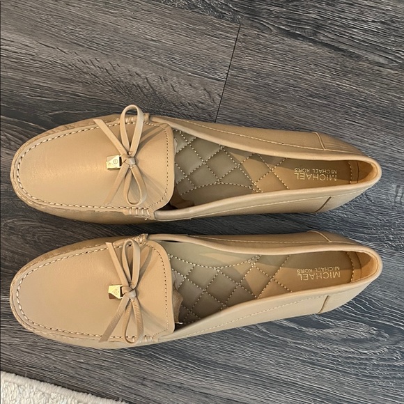 Michael Kors Shoes - NWOT Michael Kors Taupe Leather Bow Loafers with Gold Accent